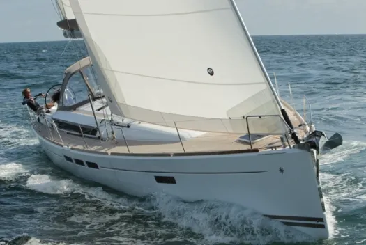 Exterior view of Kaos, a Jeanneau Sun Odyssey 509 sailboat at Olbia, Italy