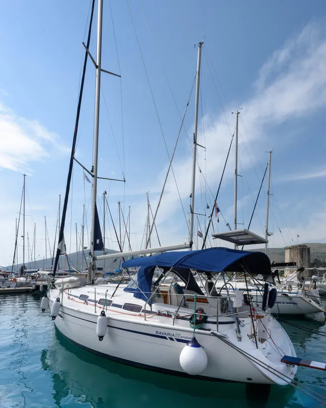 Exterior view of Dišpet, a Bavaria 33 Cruiser sailboat at Grad Trogir, Croatia