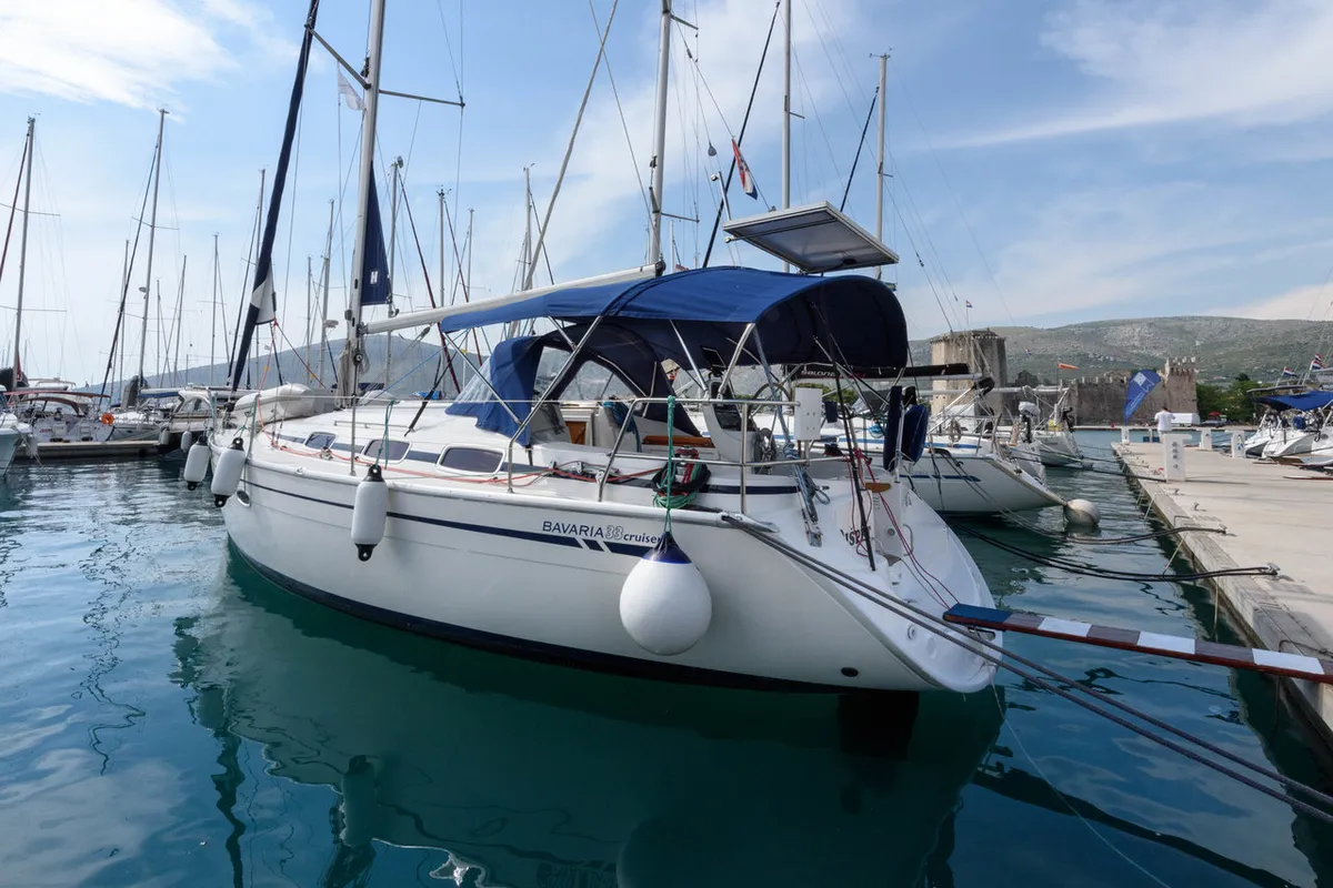 Exterior view of Dišpet, a Bavaria 33 Cruiser sailboat at Grad Trogir, Croatia
