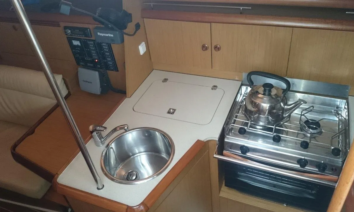 Galley of Regina IV, a Jeanneau Sun Odyssey 32i sailboat at Lavreotiki Municipal Unit, Greece