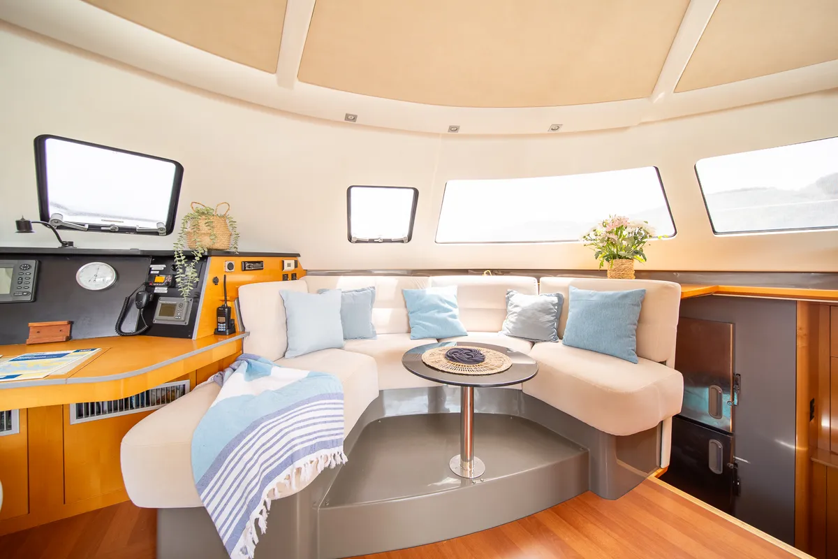 Salon of Zorba CAT Cabin 1, a Fountaine Pajot Eleuthera 60 catamaran at Aegina, Greece
