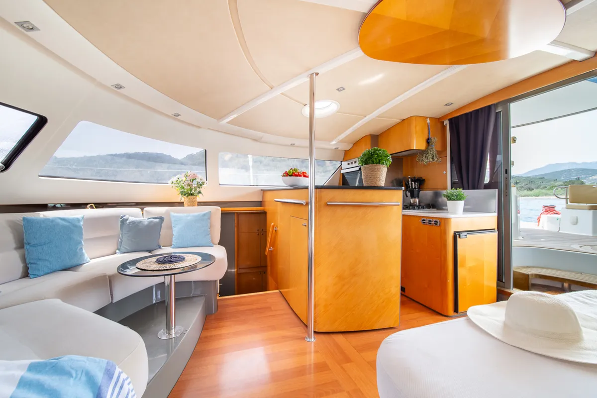 Salon of Zorba CAT Cabin 1, a Fountaine Pajot Eleuthera 60 catamaran at Aegina, Greece