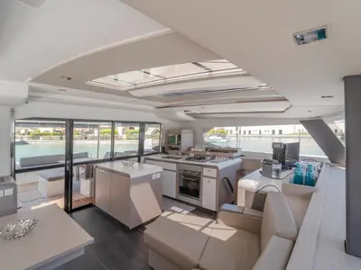 Salon of Kali II, a Fountaine Pajot Aura 51 catamaran at Capo d'Orlando, Italy