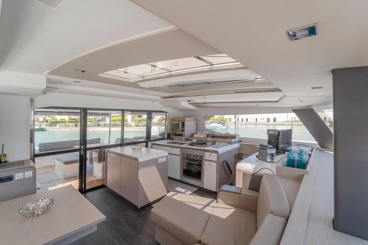 Salon of Kali II, a Fountaine Pajot Aura 51 catamaran at Capo d'Orlando, Italy