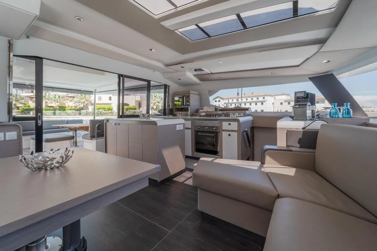 Salon of Kali II, a Fountaine Pajot Aura 51 catamaran at Capo d'Orlando, Italy