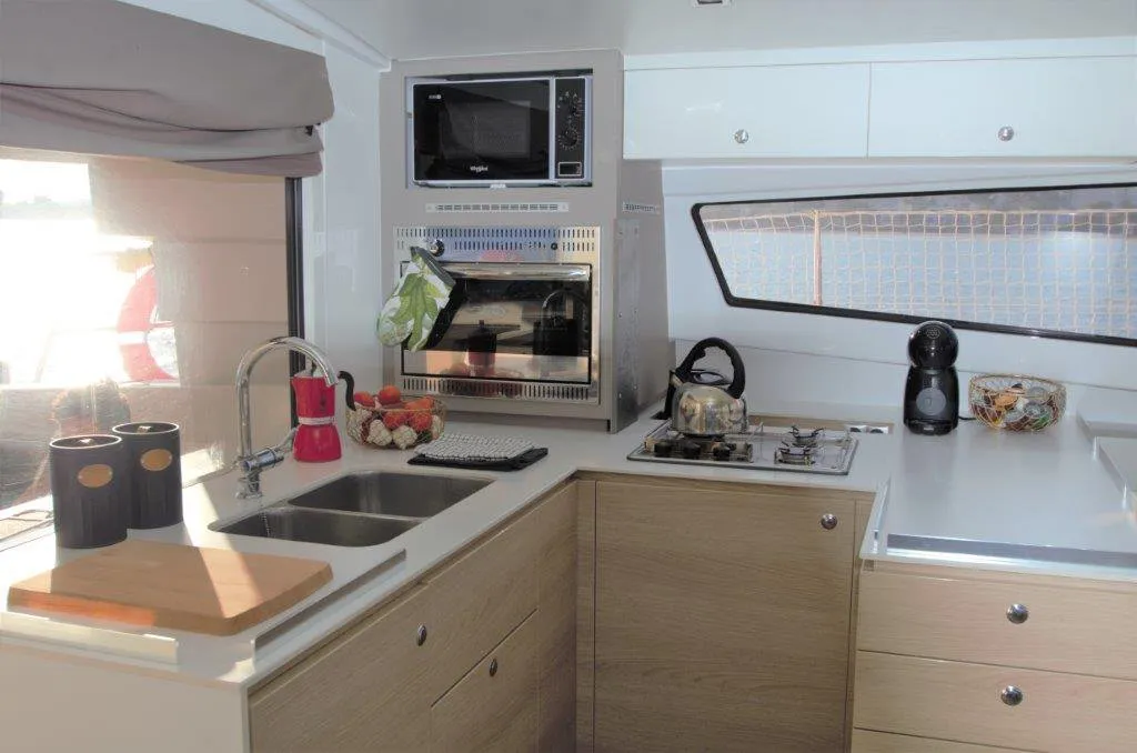 Galley of Albert, a Bali 4.5 catamaran at Port de Pollença, Spain