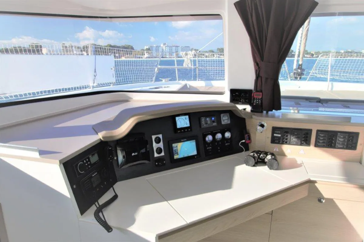Cockpit of Albert, a Bali 4.5 catamaran at Port de Pollença, Spain