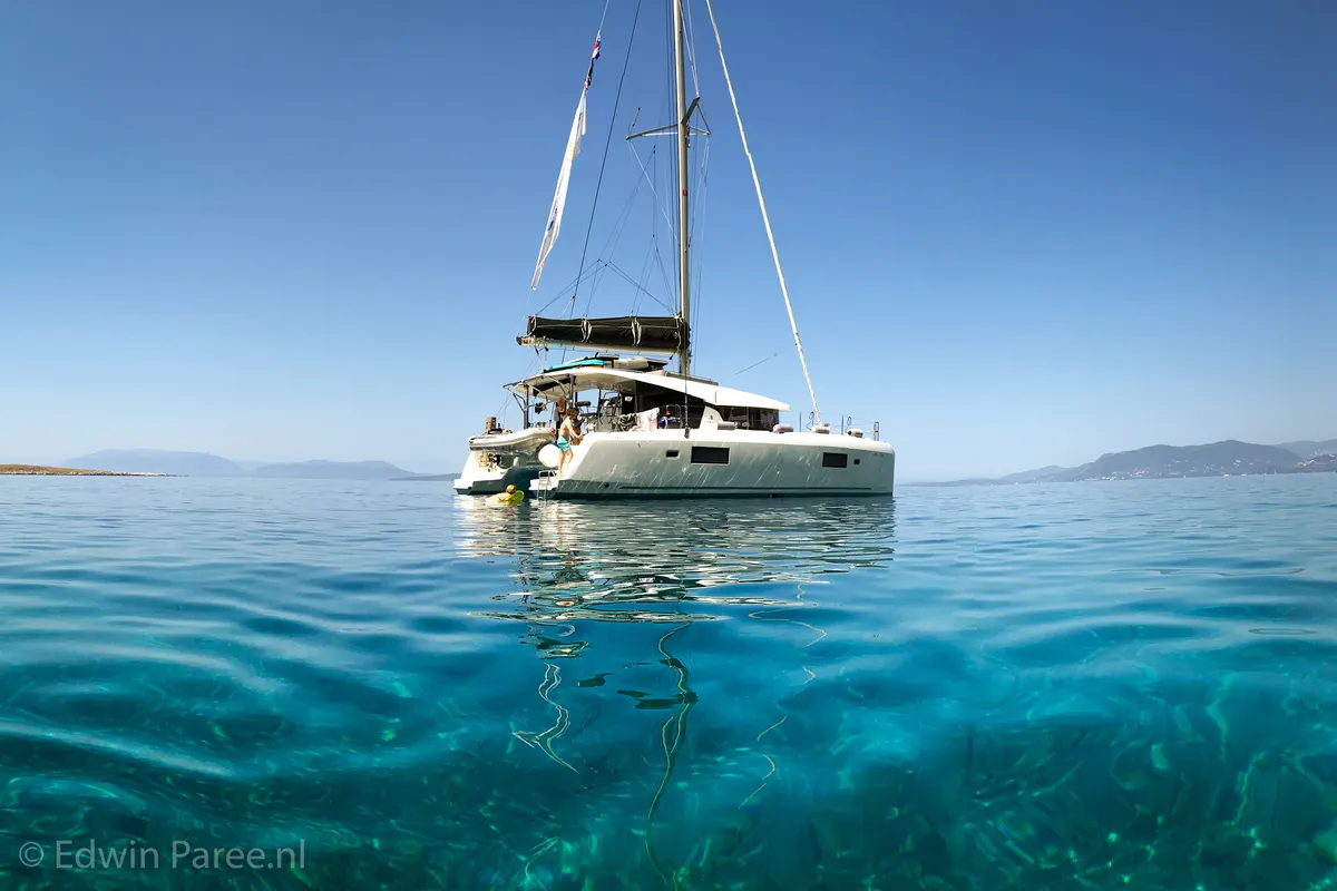 Exterior view of No Name: Master Cabin #1 (Cabin Charter 2 pax) FULLY CREWED, ALL EXPENSES, a Lagoon 42 catamaran at Municip…