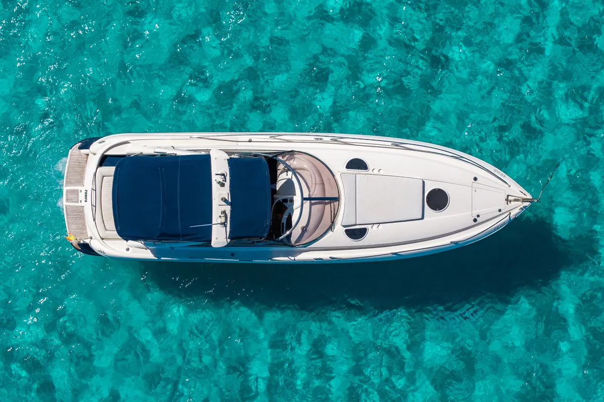 Exterior view of Pompa, a Sunseeker Hawk 34 motorboat at Ibiza, Spain