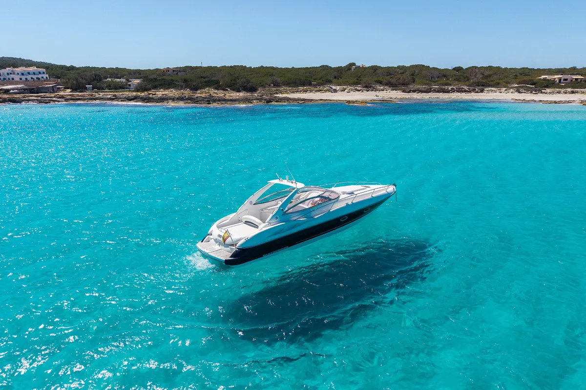 Exterior view of Pompa, a Sunseeker Hawk 34 motorboat at Ibiza, Spain