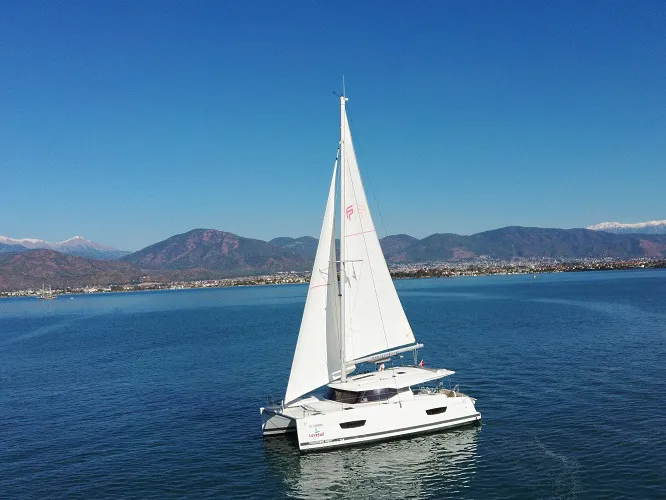 Exterior view of El Camino, a Fountaine Pajot Lucia 40 catamaran at Fethiye, Turkey