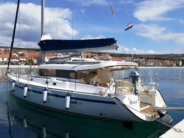Exterior view of The Big One Two, a Dufour Atoll 6 sailboat at Primošten, Croatia