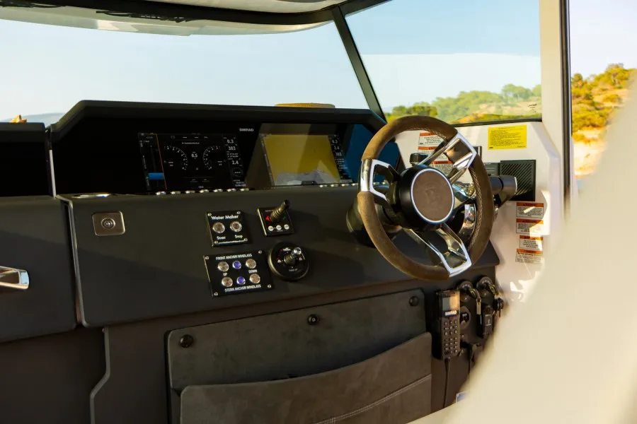 Cockpit of MY CHARACTER, a Axopar 37 XC Cross Cabin motorboat at Kalyvia Thorikou Municipal Unit, Greece