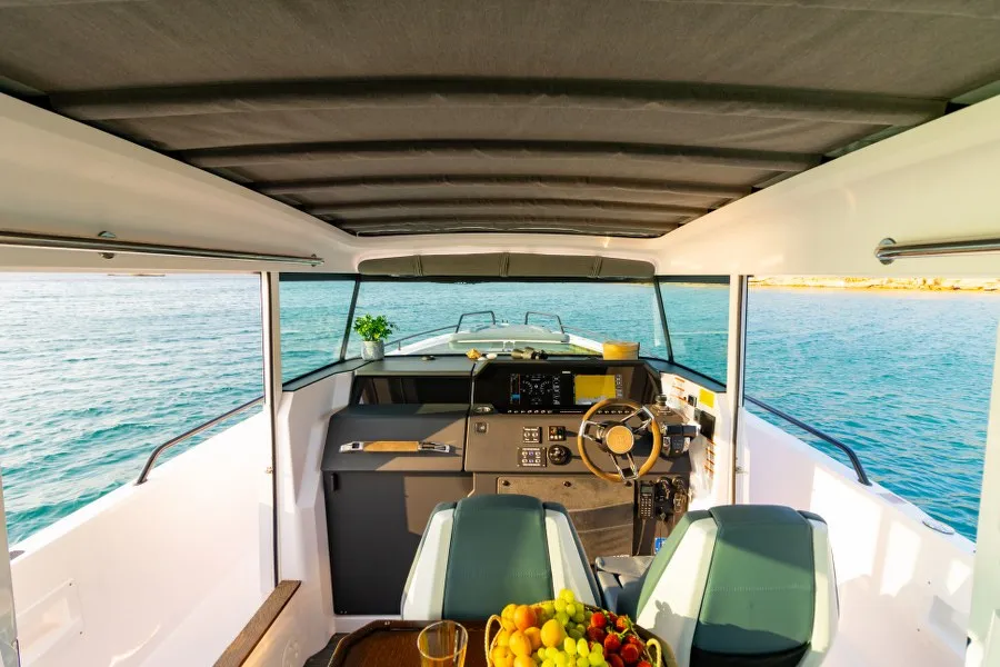 Cockpit of MY CHARACTER, a Axopar 37 XC Cross Cabin motorboat at Kalyvia Thorikou Municipal Unit, Greece