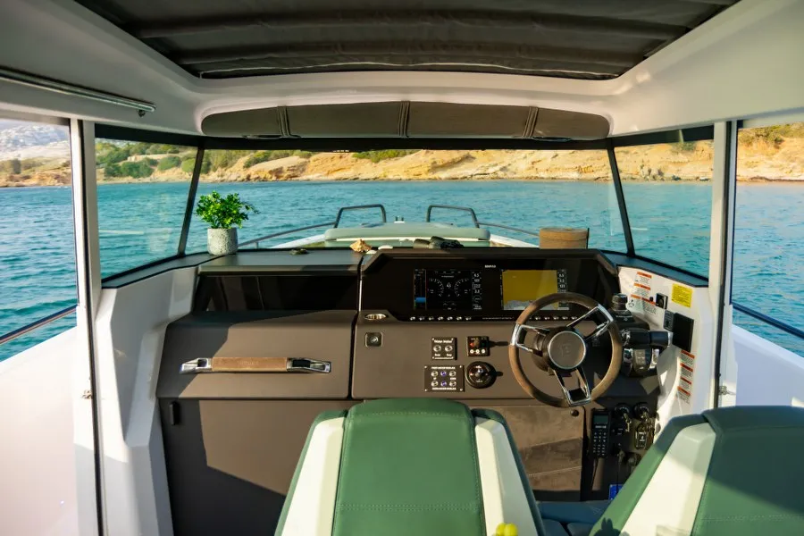 Cockpit of MY CHARACTER, a Axopar 37 XC Cross Cabin motorboat at Kalyvia Thorikou Municipal Unit, Greece