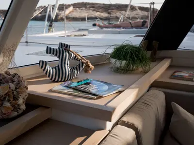 Salon of Astrea , a Fountaine Pajot Astréa 42 catamaran at Castellammare del Golfo, Italy