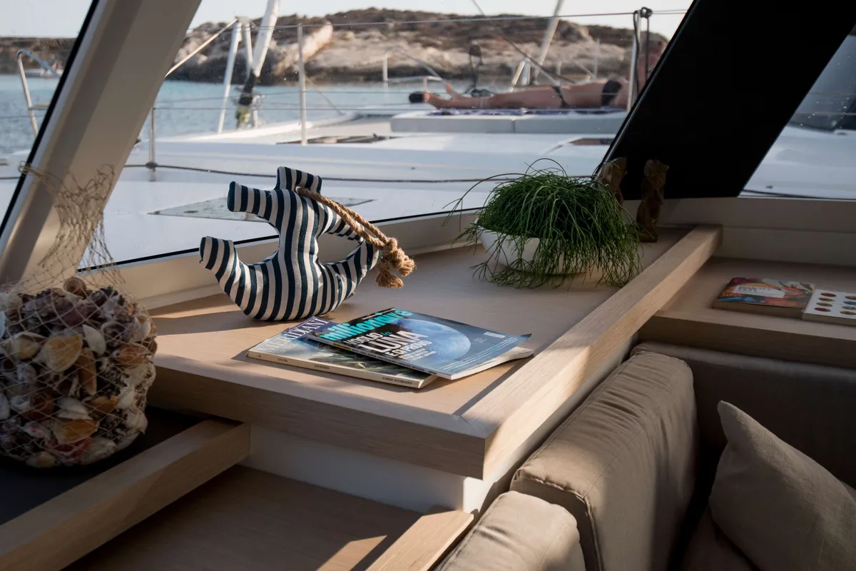Salon of Astrea , a Fountaine Pajot Astréa 42 catamaran at Castellammare del Golfo, Italy