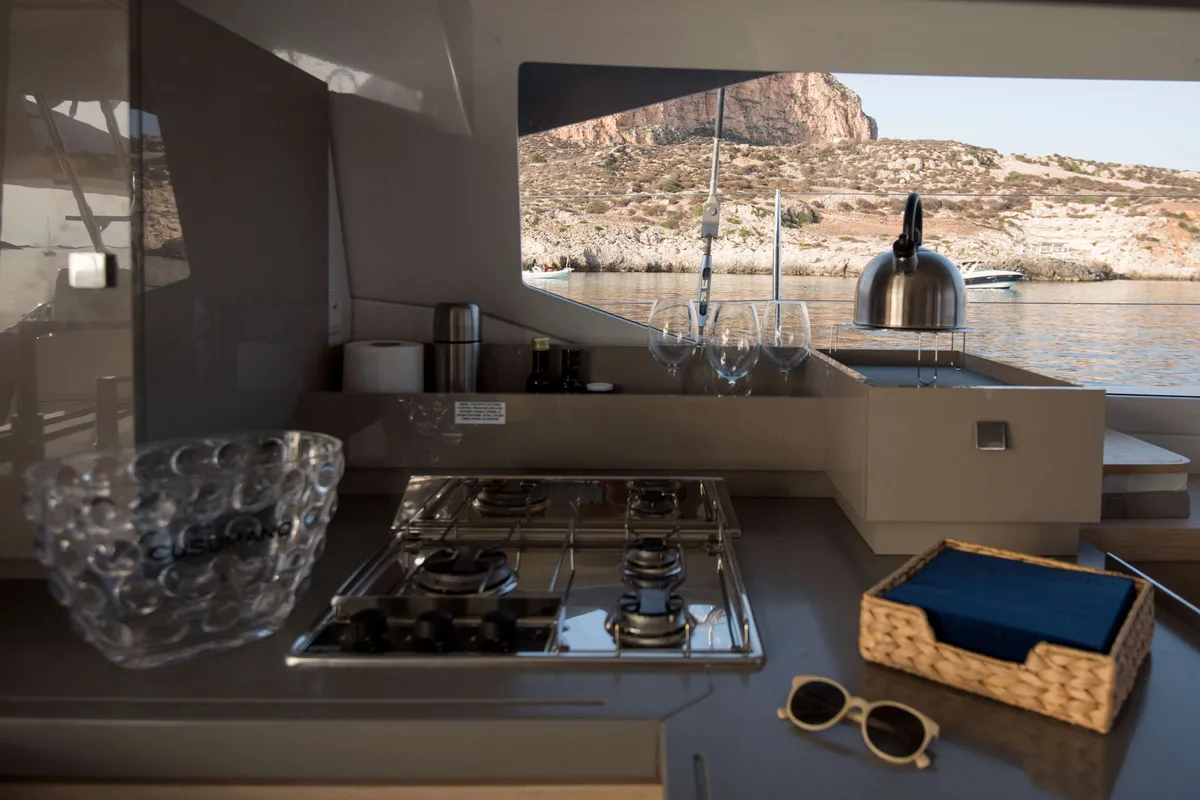 Galley of Astrea , a Fountaine Pajot Astréa 42 catamaran at Castellammare del Golfo, Italy