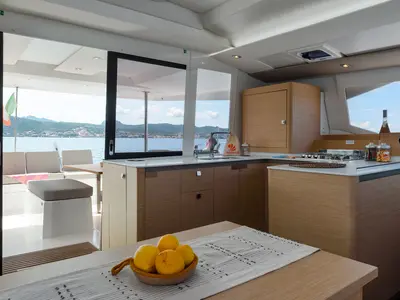 Galley of Amapola - A/C, Generator, Water maker. Solar panel, a Fountaine Pajot Astréa 42 catamaran at Cannigione, Italy