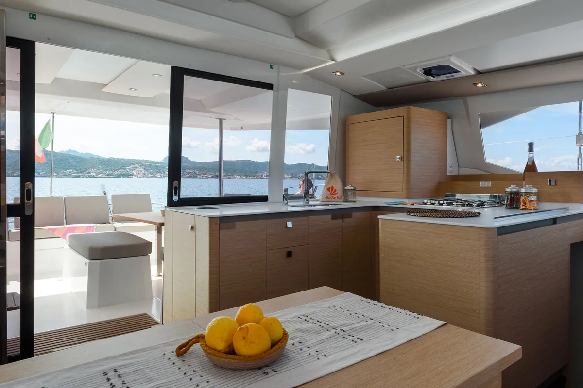 Galley of Amapola - A/C, Generator, Water maker. Solar panel, a Fountaine Pajot Astréa 42 catamaran at Cannigione, Italy