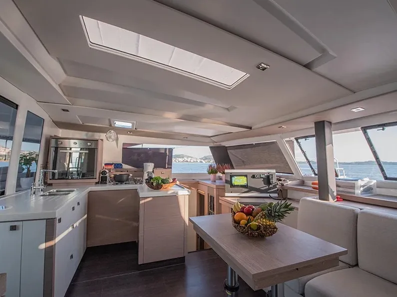 Salon of Nou Nou 1, a Fountaine Pajot Astréa 42 catamaran at Lavrion, Greece