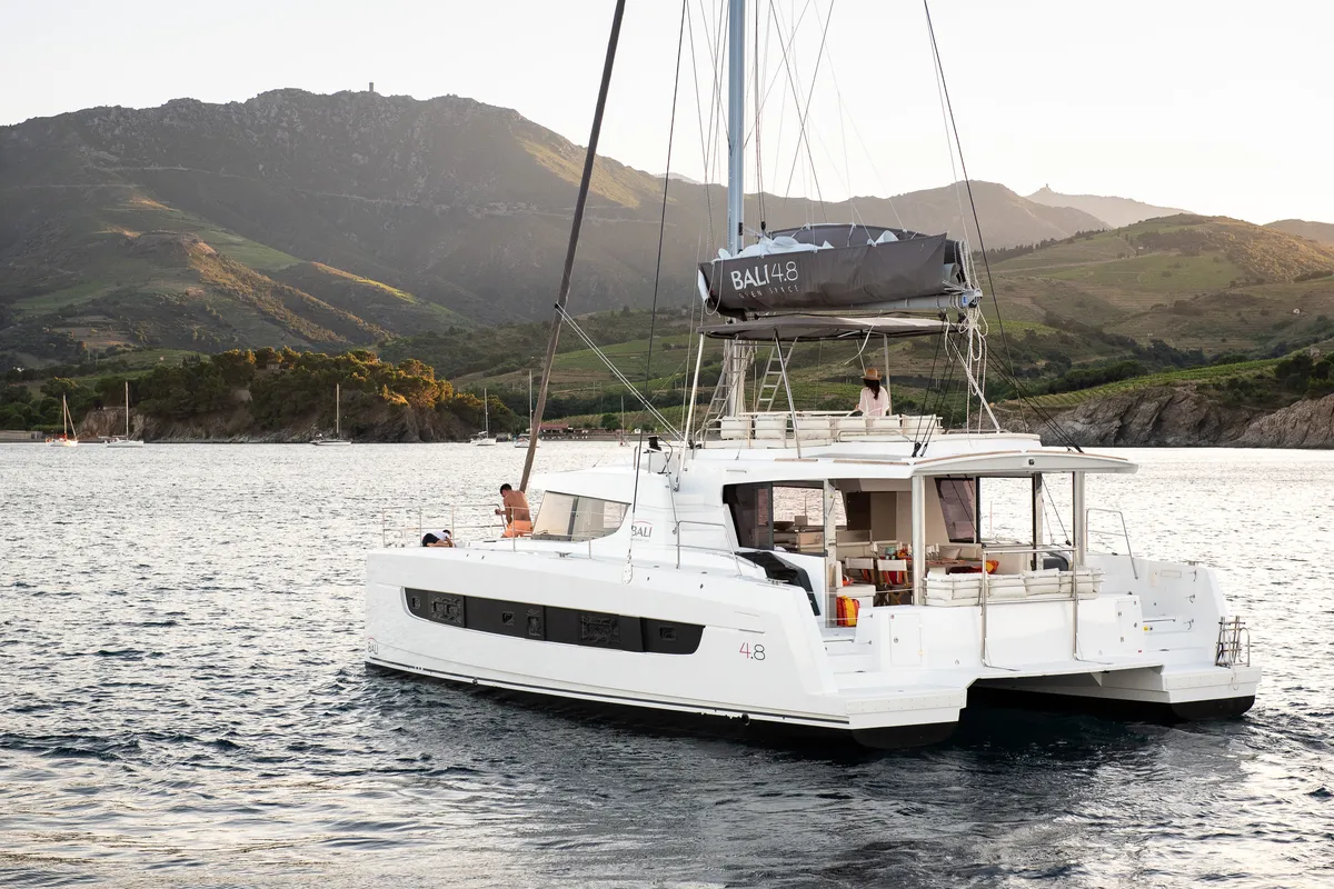 Exterior view of Martinon, a Bali 4.8 catamaran at Port d'Andratx, Spain