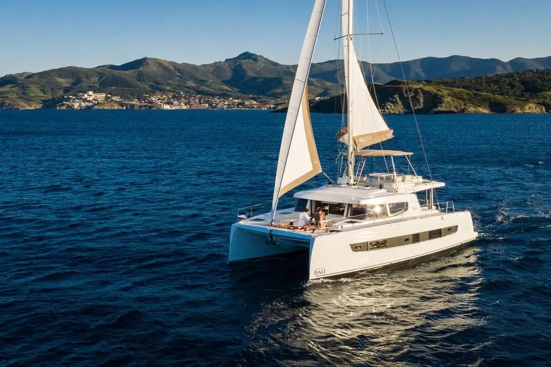 Exterior view of Martinon, a Bali 4.8 catamaran at Port d'Andratx, Spain