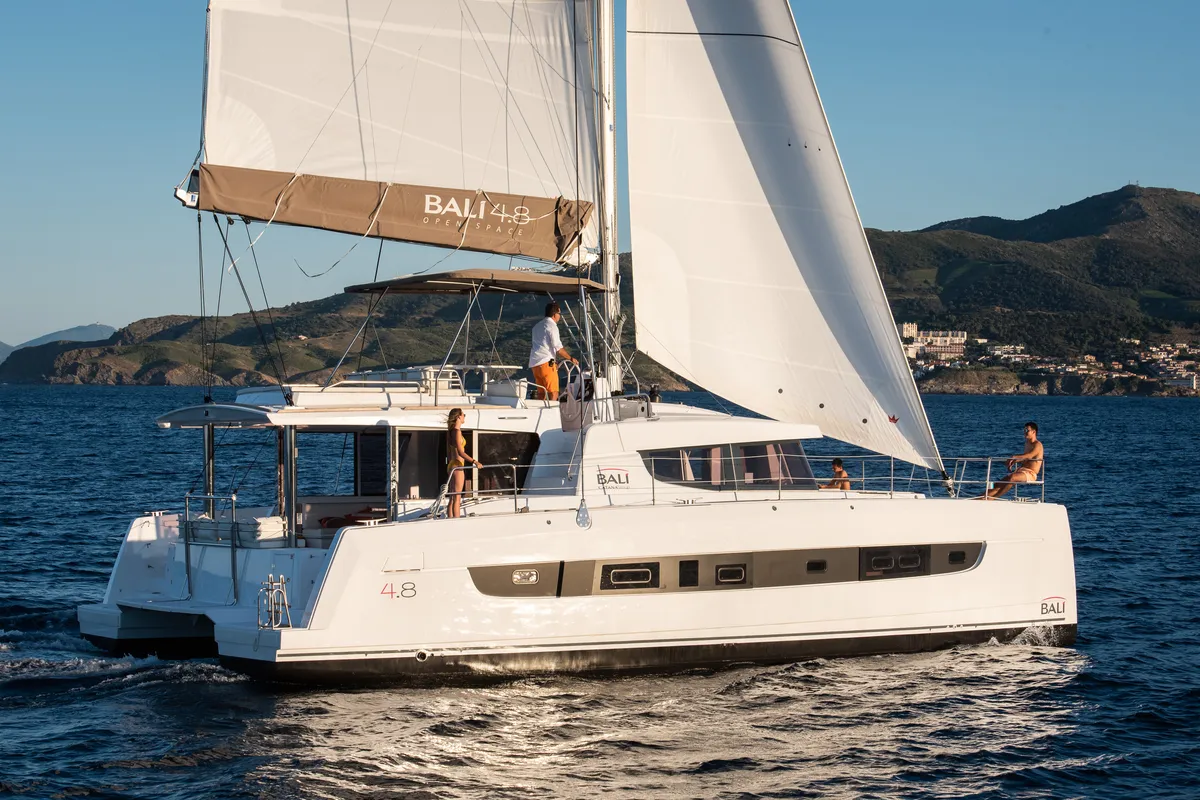 Exterior view of Martinon, a Bali 4.8 catamaran at Port d'Andratx, Spain