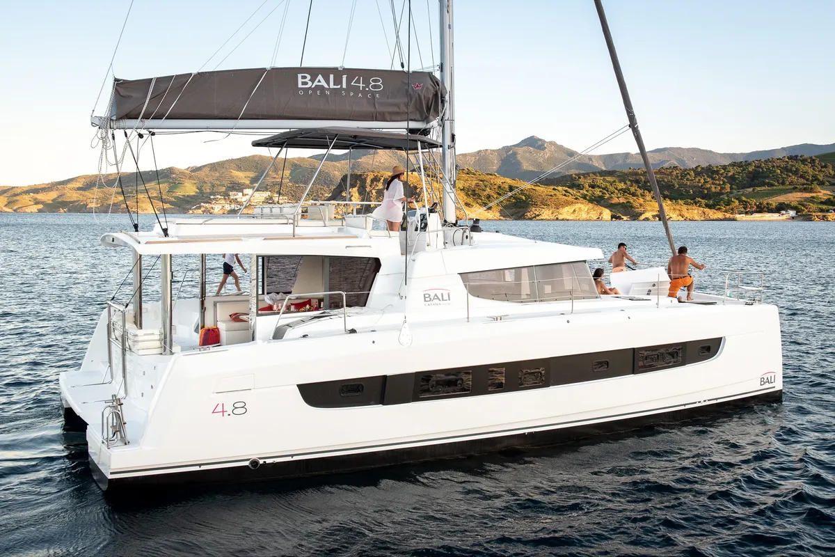 Exterior view of Martinon, a Bali 4.8 catamaran at Port d'Andratx, Spain
