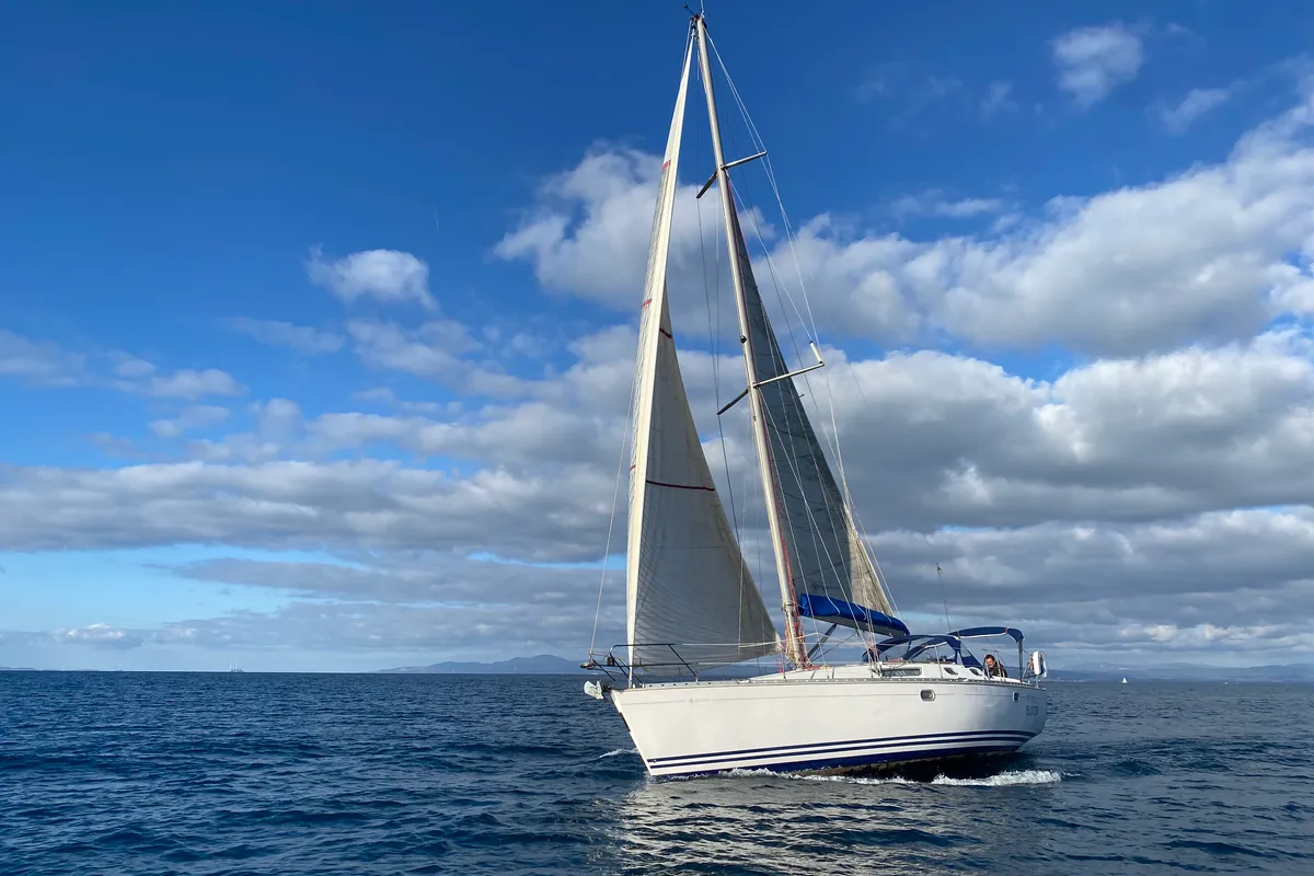 Exterior view of Jalù, a Jeanneau Sun Odyssey 42.2 sailboat at Punta Ala, Italy
