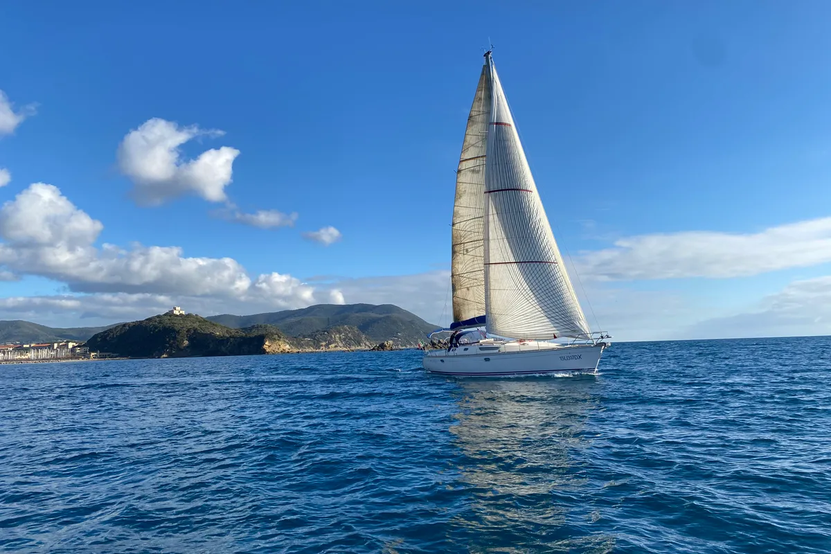 Exterior view of Jalù, a Jeanneau Sun Odyssey 42.2 sailboat at Punta Ala, Italy