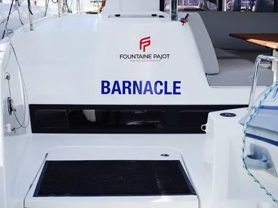 Barnacle, a Fountaine Pajot Isla 40 catamaran at Roche Caiman, Seychelles
