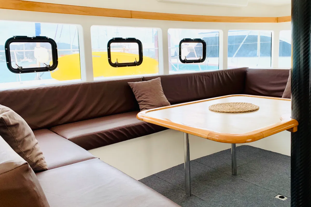 Salon of Iris, a Catlante 600 catamaran at Roche Caiman, Seychelles