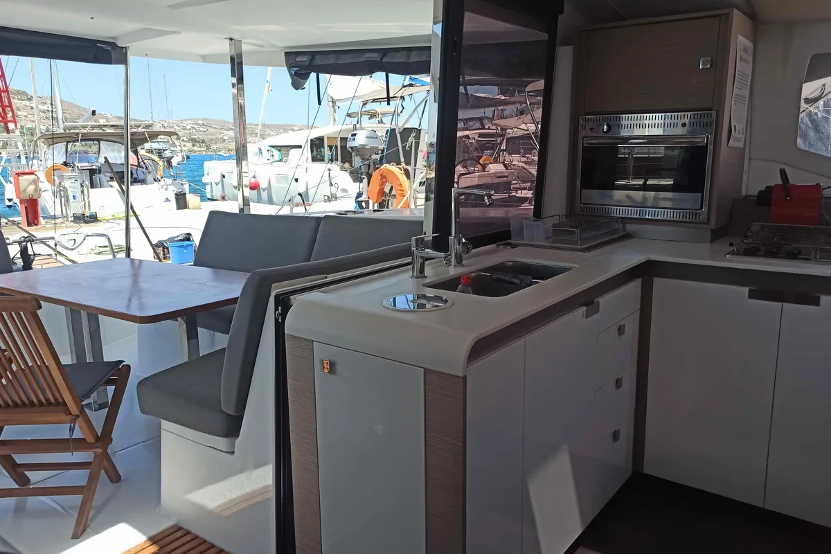 ALMIRIKI, a Fountaine Pajot Isla 40 catamaran at Parikia, Greece
