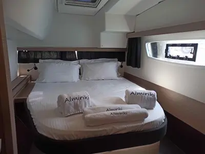 ALMIRIKI, a Fountaine Pajot Isla 40 catamaran at Parikia, Greece