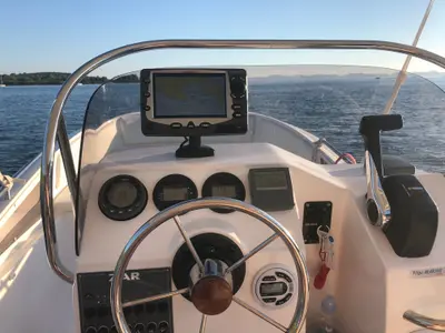 Cockpit of no name, a Zar 57 WD motorboat at Općina Sukošan, Croatia