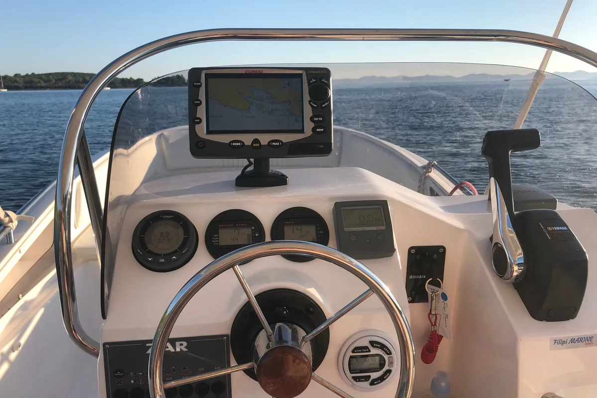 Cockpit of no name, a Zar 57 WD motorboat at Općina Sukošan, Croatia