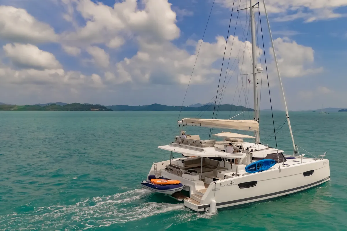 Exterior view of Chammak Challo, a Fountaine Pajot Elba 45 catamaran at Mai Khao, Thailand