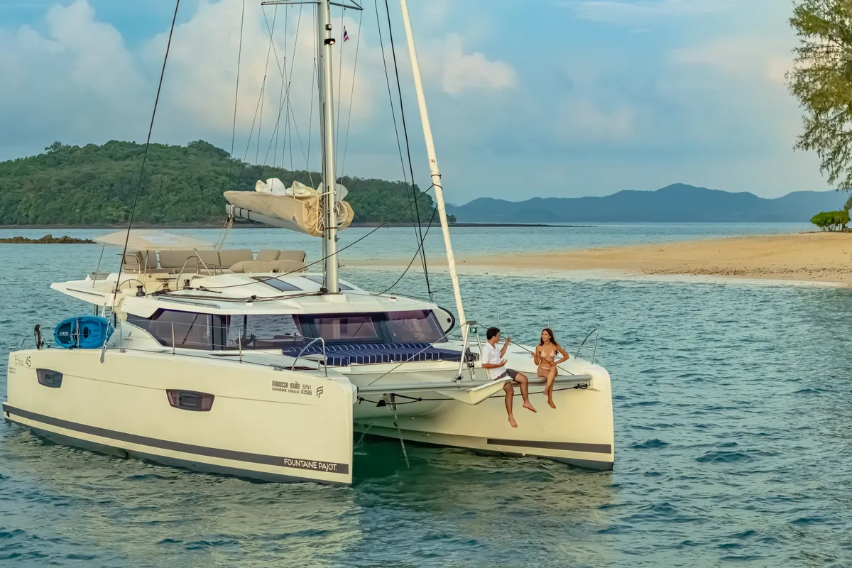 Exterior view of Chammak Challo, a Fountaine Pajot Elba 45 catamaran at Mai Khao, Thailand