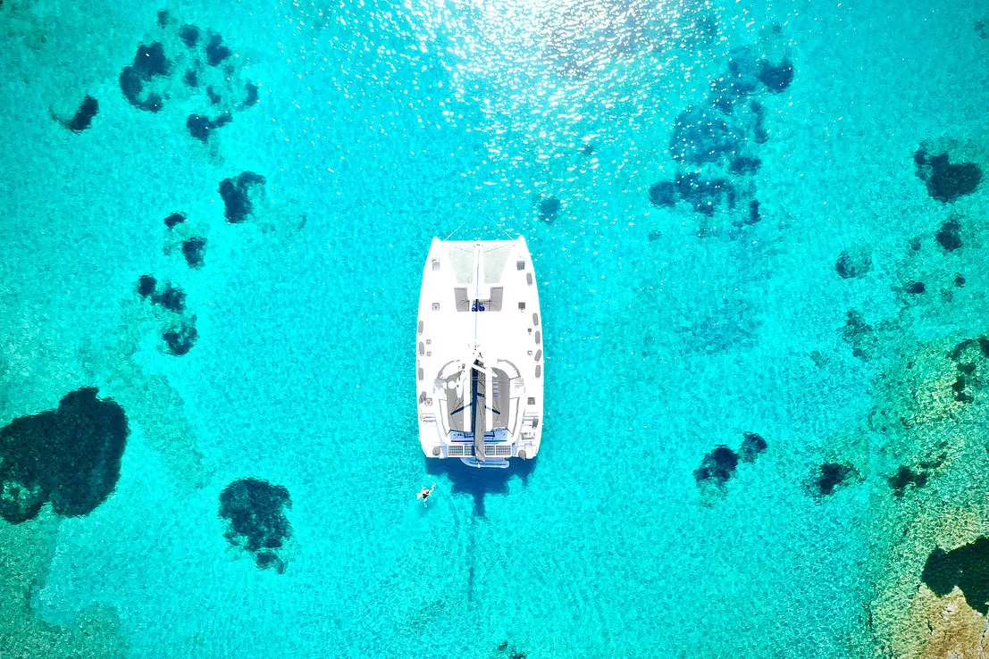 Exterior view of Keyma, a Lagoon 46 catamaran at Agios Stefanos, Greece
