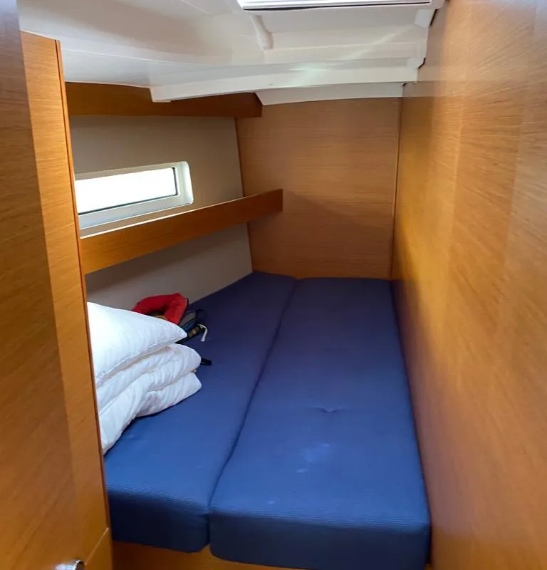 Cabin on Alboran Caipiroska, a Jeanneau Sun Odyssey 440 sailboat at es Jonquet, Spain