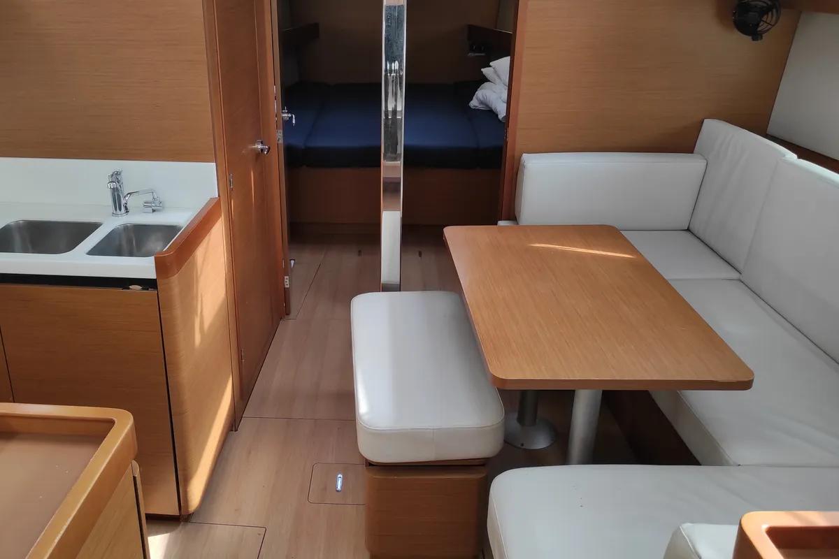 Salon of Alboran Caipiroska, a Jeanneau Sun Odyssey 440 sailboat at es Jonquet, Spain