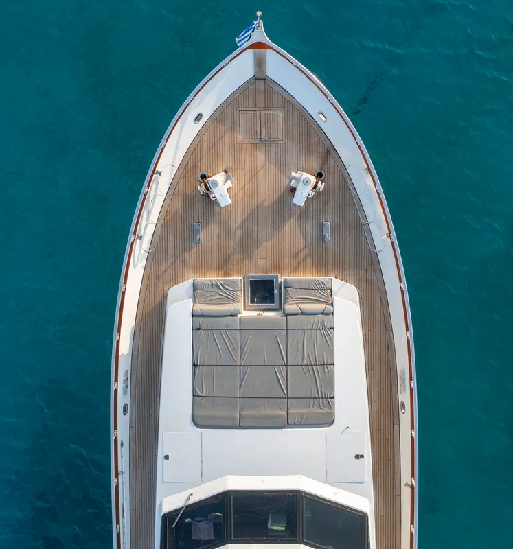 Deck of Shiva, a Cantieri di Pisa Akhir 27 motor yacht at Ornos, Greece