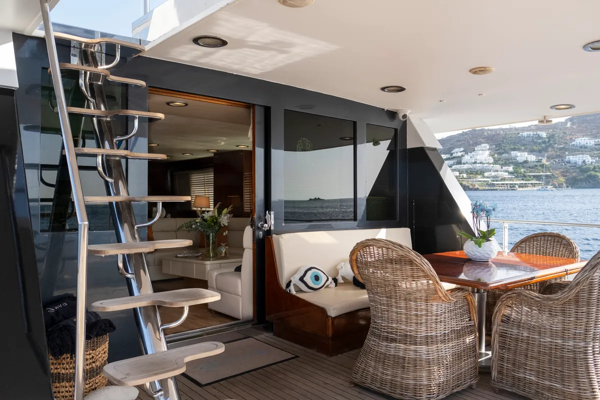 Deck of Shiva, a Cantieri di Pisa Akhir 27 motor yacht at Ornos, Greece
