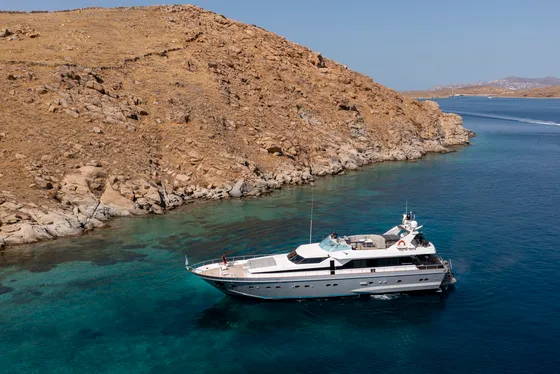 Exterior view of Shiva, a Cantieri di Pisa Akhir 27 motor yacht at Ornos, Greece