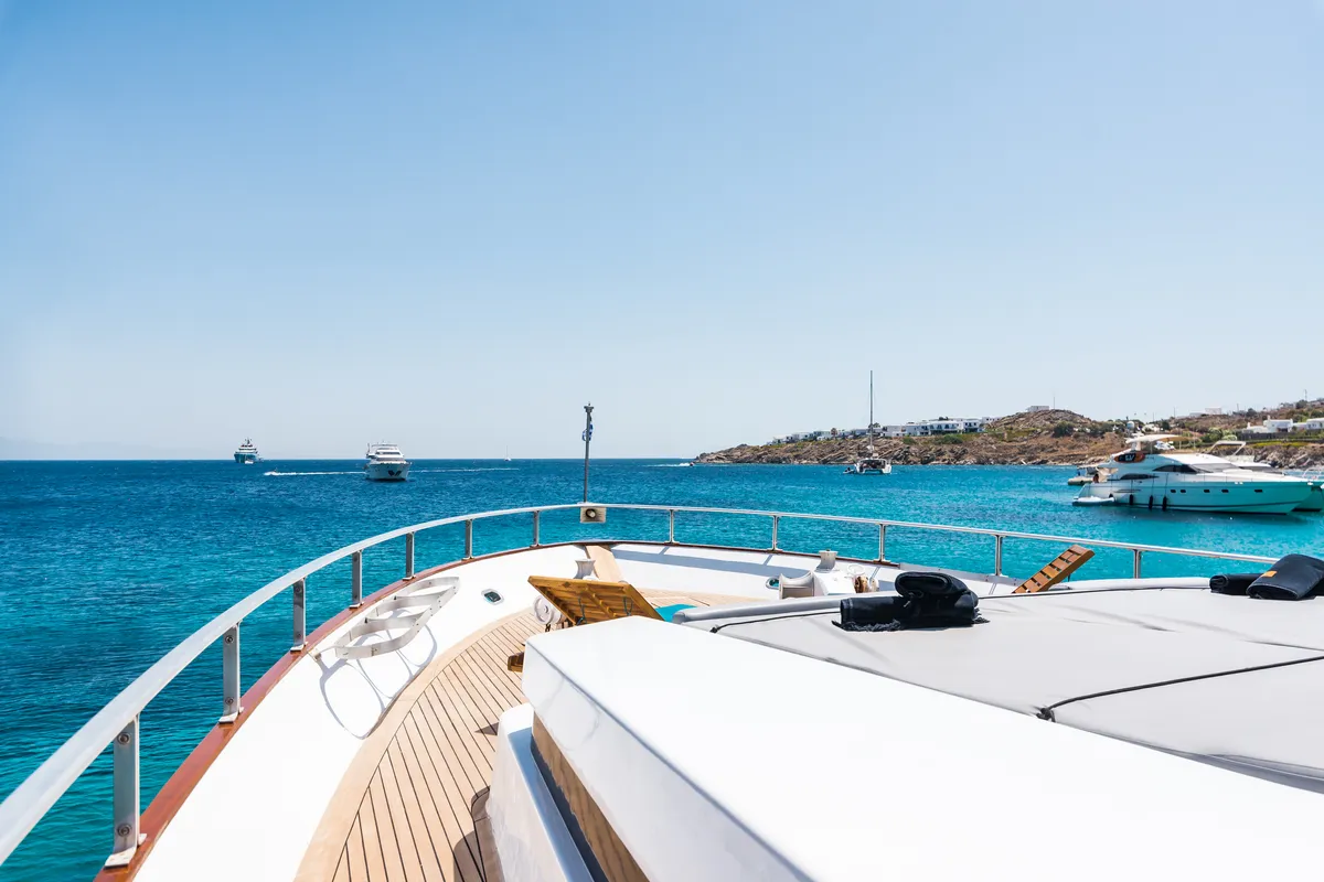Deck of Shiva, a Cantieri di Pisa Akhir 27 motor yacht at Ornos, Greece