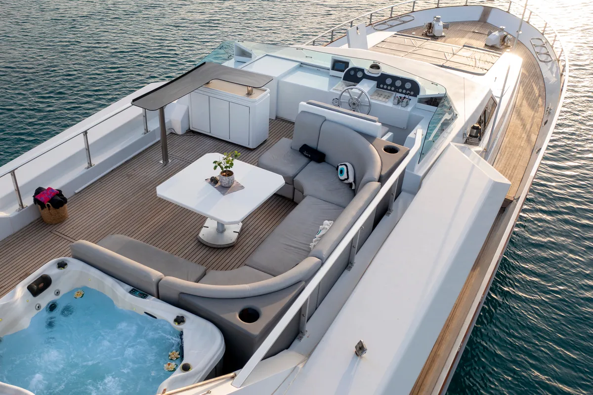 Deck of Shiva, a Cantieri di Pisa Akhir 27 motor yacht at Ornos, Greece
