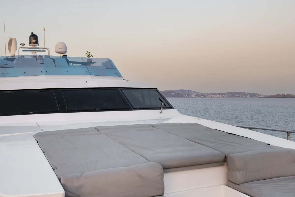Deck of Shiva, a Cantieri di Pisa Akhir 27 motor yacht at Ornos, Greece