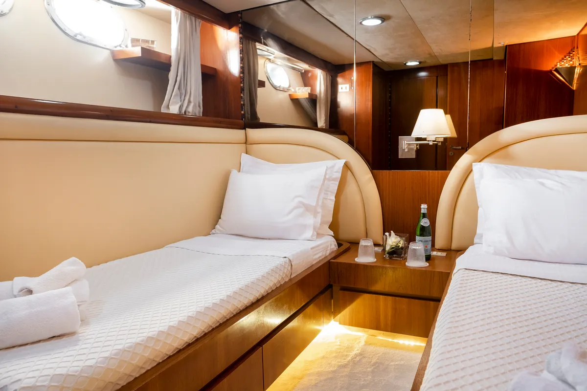 Cabin on Shiva, a Cantieri di Pisa Akhir 27 motor yacht at Ornos, Greece