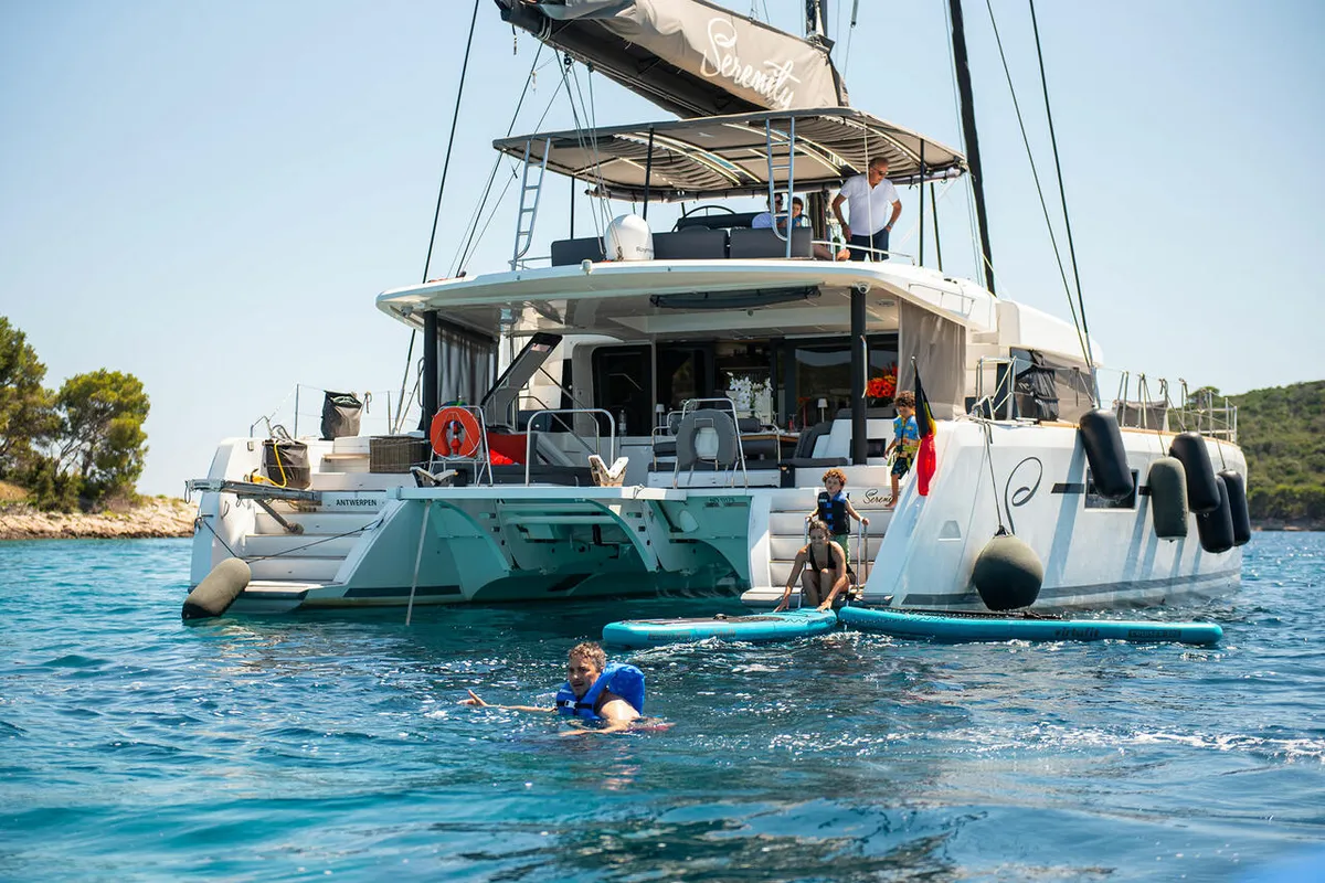 Exterior view of Serenity, a Lagoon 52 catamaran at Grad Kaštela, Croatia